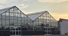 Two Vail greenhouses with automatic sliding doors provide easy access for customers to the garden center.